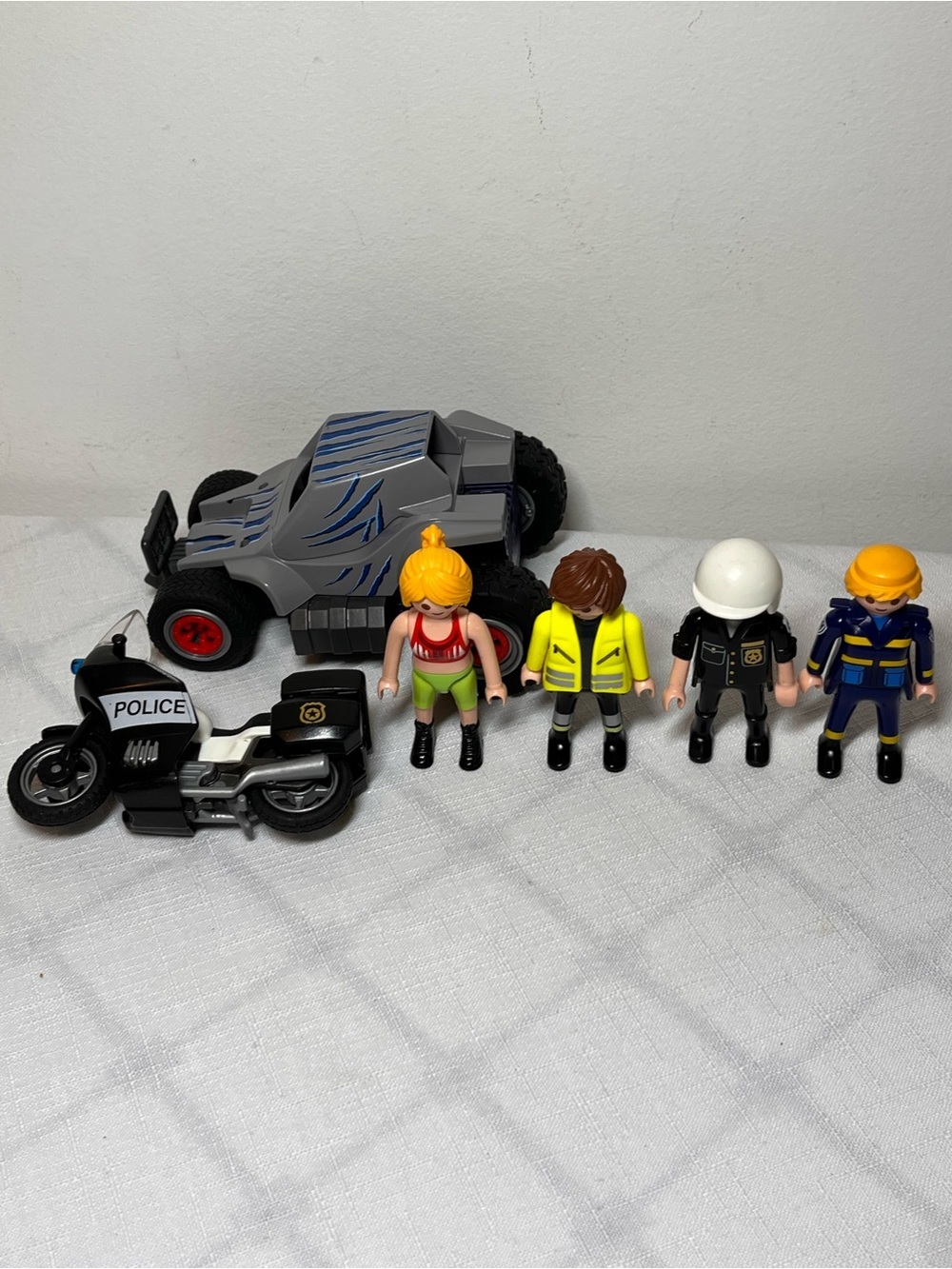 Playmobil play set. 
4 figures. Car. Police motorcycle.